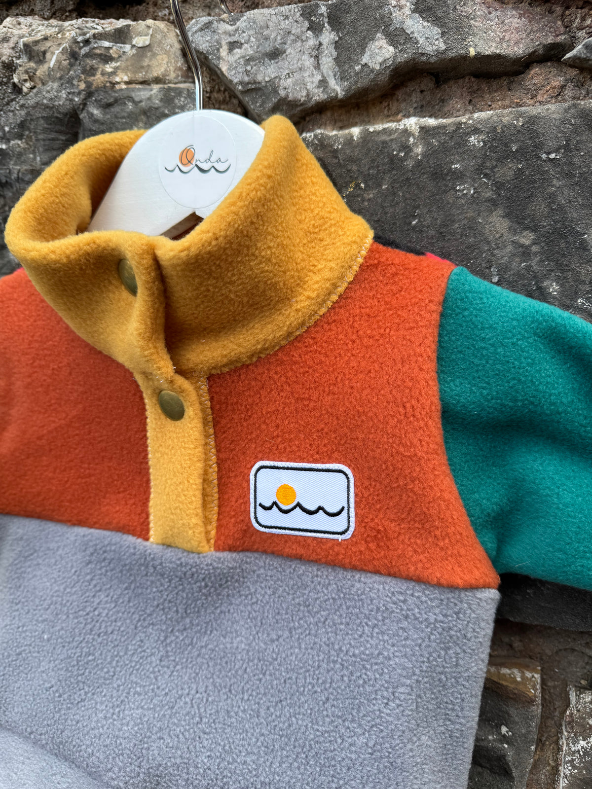 New born with buttons