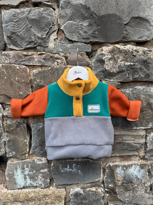New born with buttons