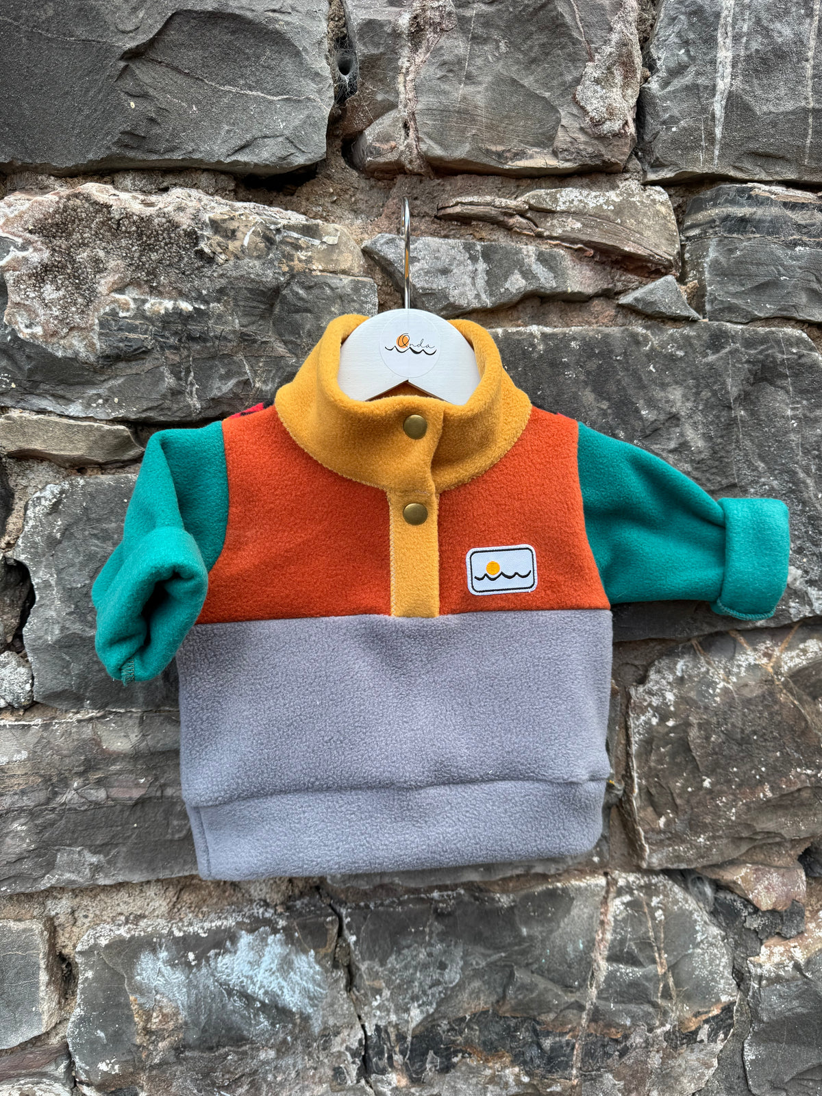 New born with buttons