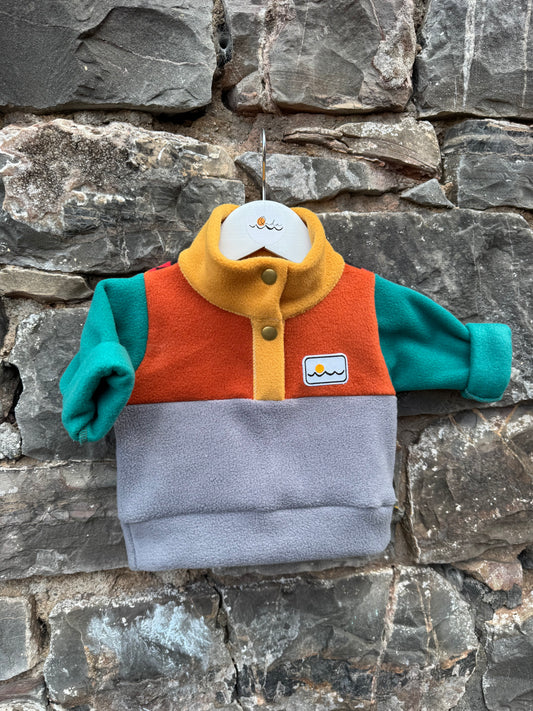New born with buttons